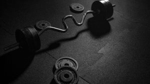 Weights on the gym floor after personal training session