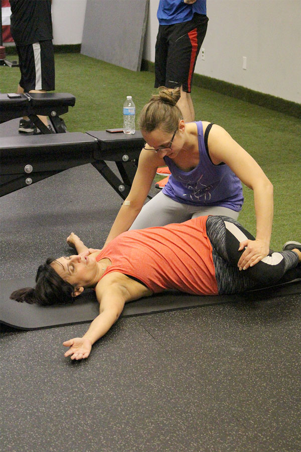 Warm up and stretch in small group fitness class